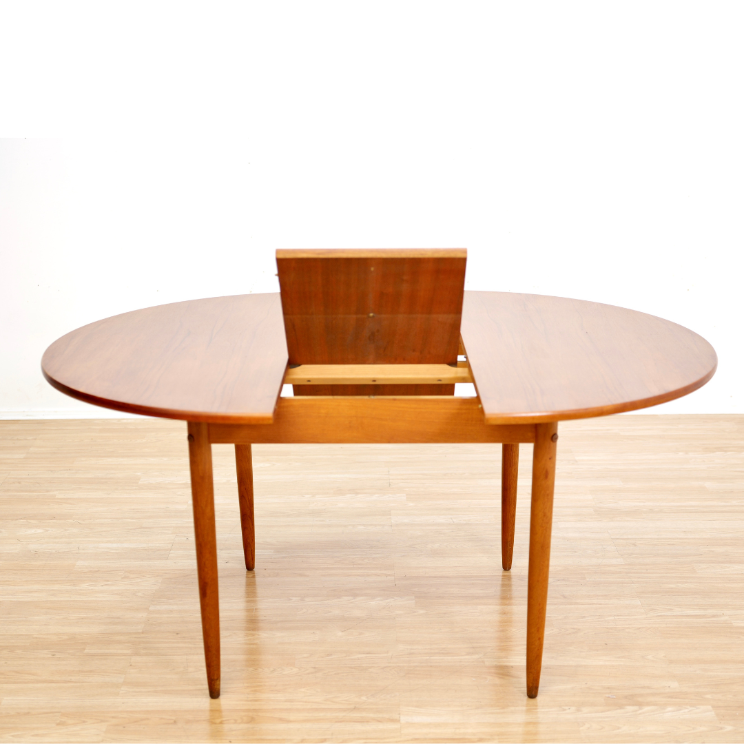 MID CENTURY ROUND TEAK EXTENDING DINING TABLE