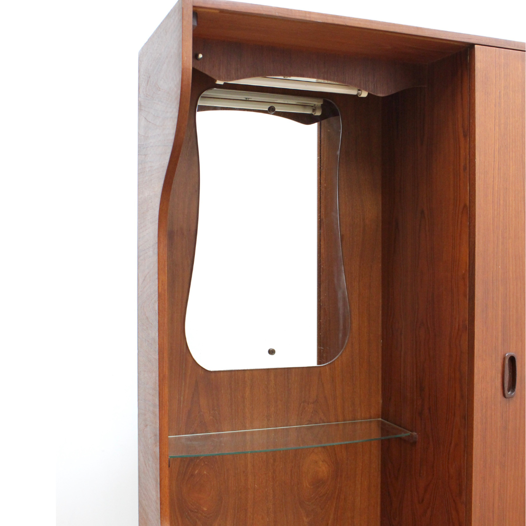 MID CENTURY TEAK ARMOIRE BY HUBBI-ROBE