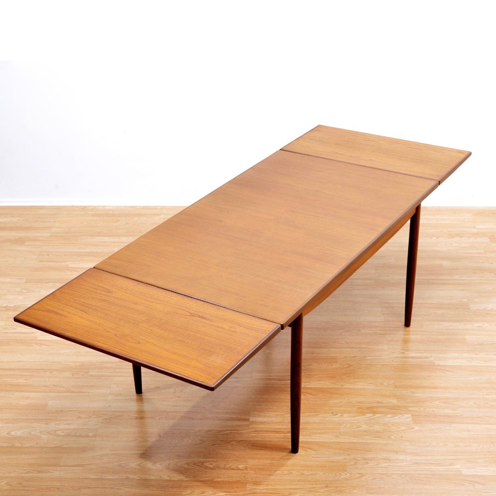 MID CENTURY EXTENDING DINING TABLE BY KOFOD LARSEN