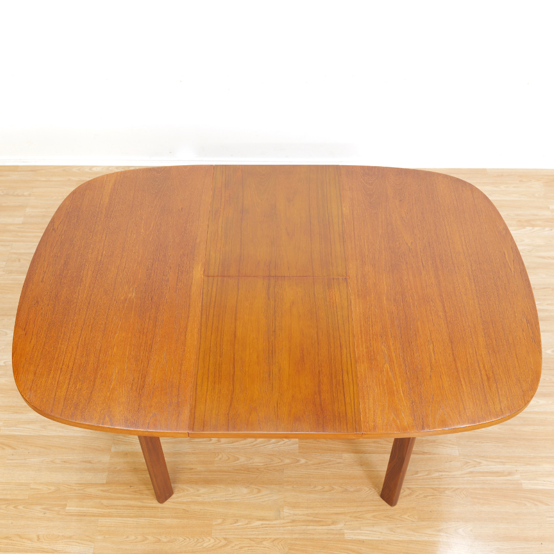 MID CENTURY EXTENDING TEAK DINING TABLE BY G PLAN