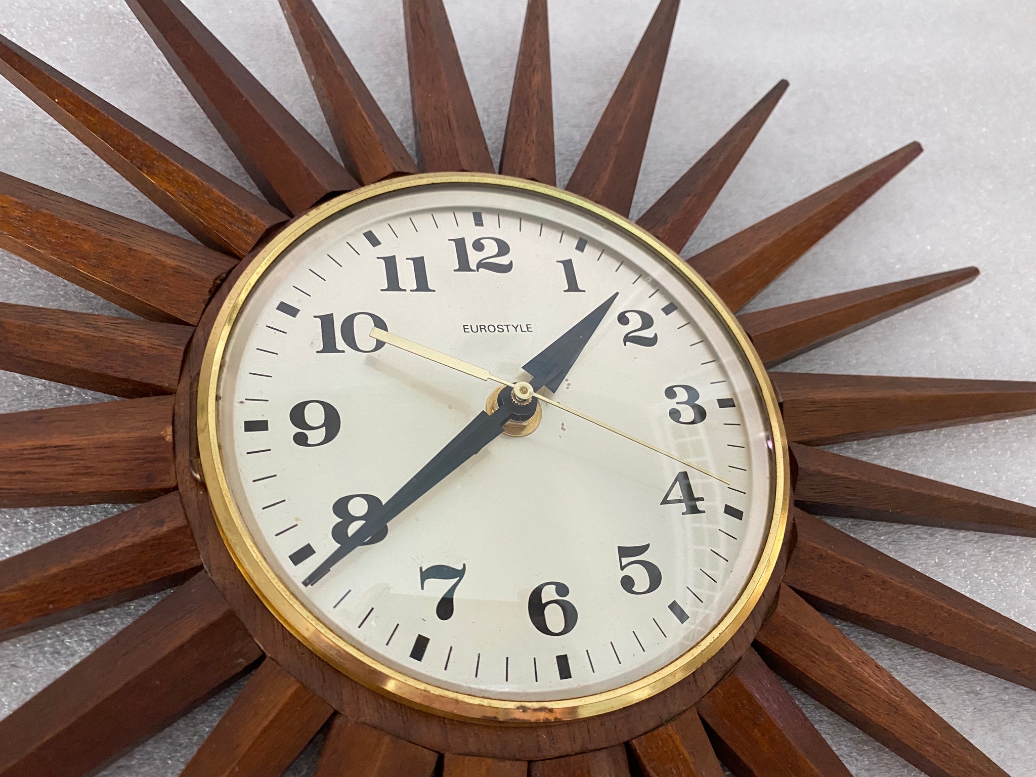 MID CENTURY STARBURST WALL CLOCK BY EUROSTYLE