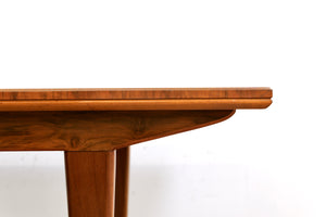 MID CENTURY ENGLISH WALNUT EXTENDING DINING TABLE BY ALFRED COX