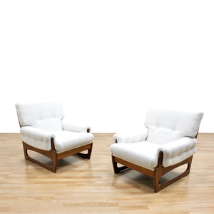 PAIR OF MID CENTURY LOUNGE CHAIRS IN BOUCLE